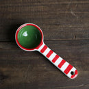 Red and green striped tea spoon