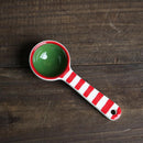 Red and green striped tea spoon
